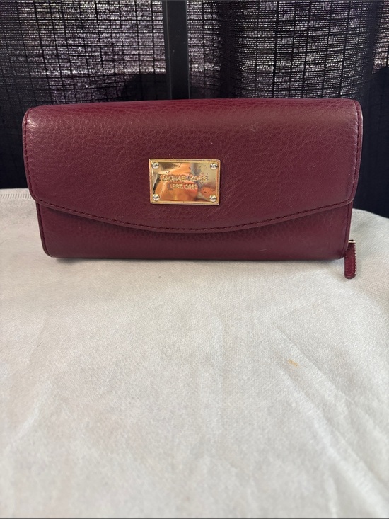 Michael Kors Handbags - Michael Kors Burgundy Leather Wallet with Gold Plaque